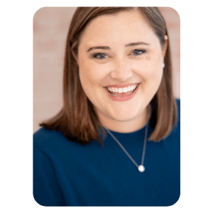 A headshot of Dr. Lauren Maltby.  She is smiling and wearing a blue sweater.